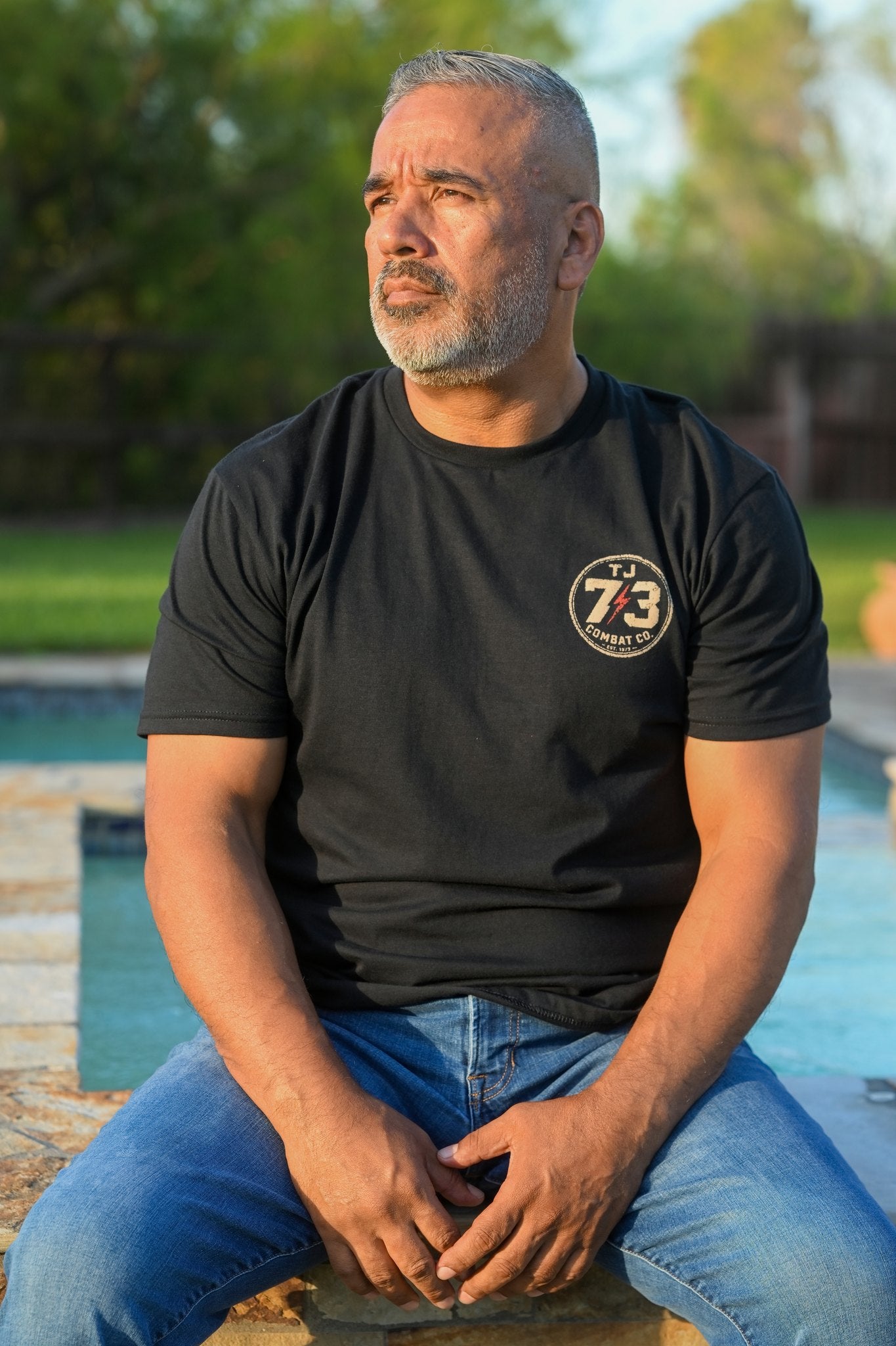 TJ73 Combat Co. black tee — front left-chest 73 badge