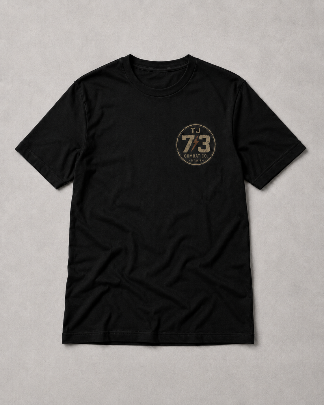 TJ73 Combat Co. black tee — front 73 badge, product view